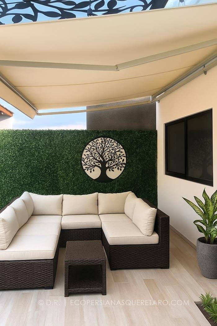 Terraza debajo de un toldo para ventana